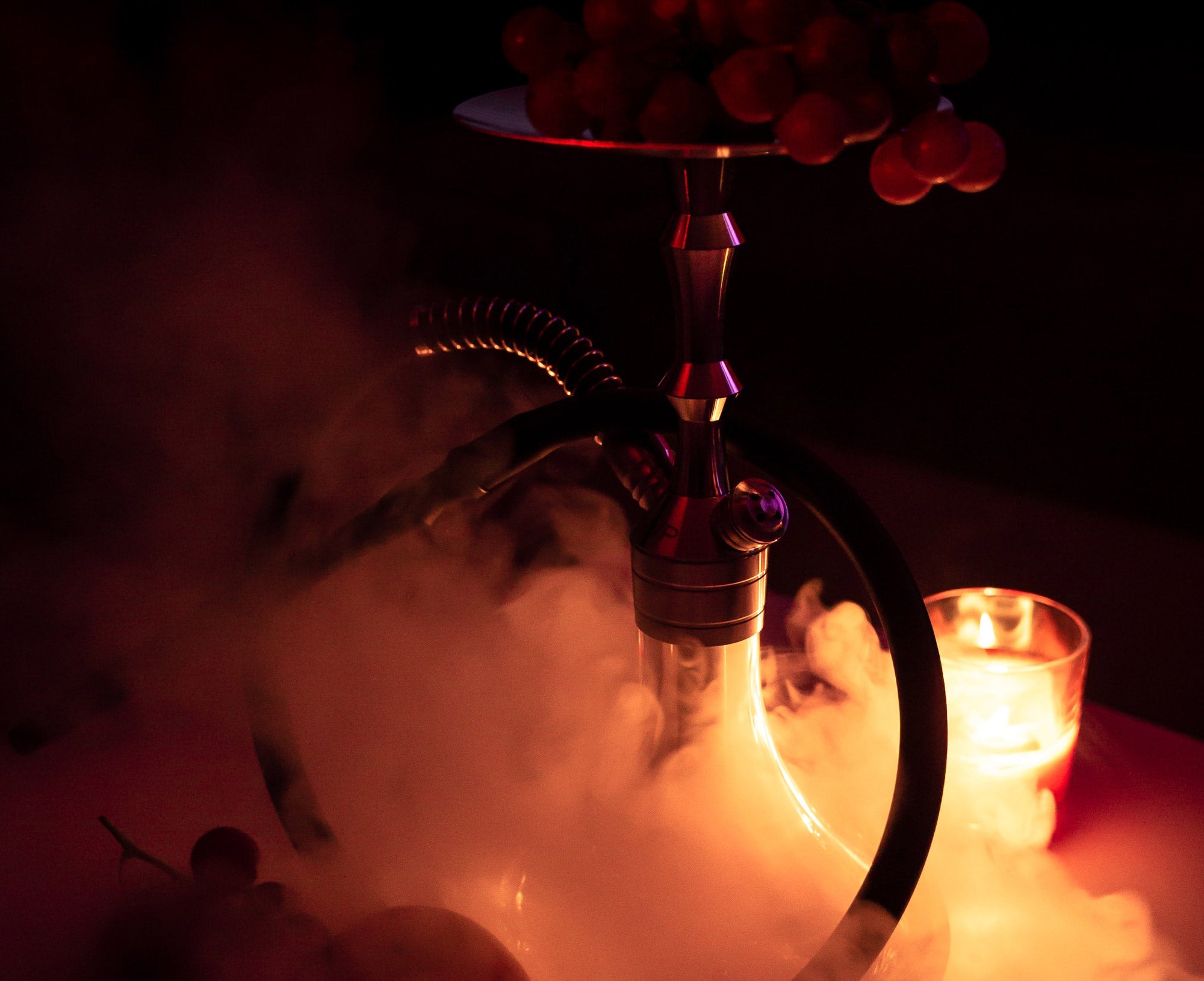 Hookah with smoke and candle